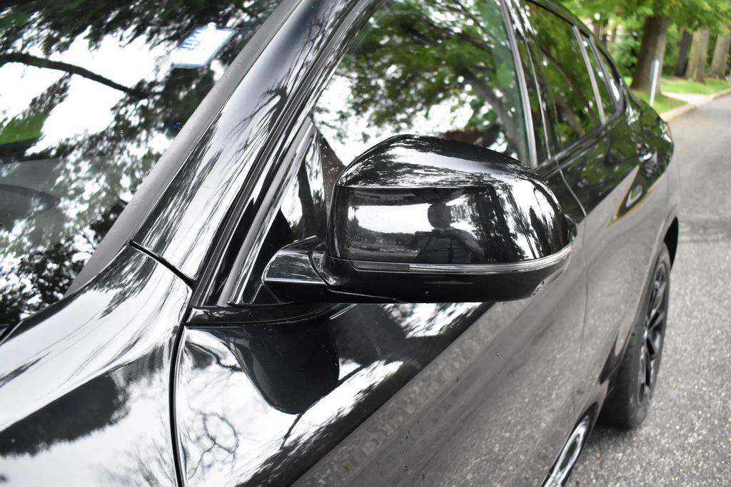 used 2023 BMW X4 car, priced at $34,495