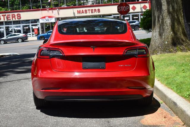 used 2022 Tesla Model 3 car, priced at $23,495