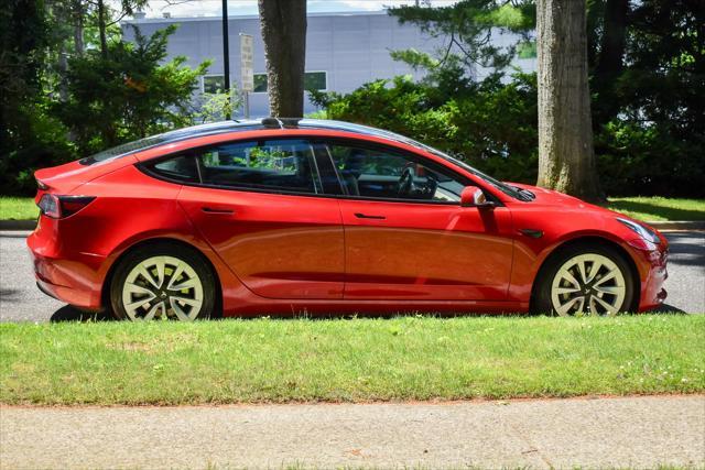 used 2022 Tesla Model 3 car, priced at $23,495