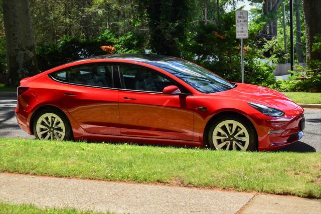 used 2022 Tesla Model 3 car, priced at $23,495