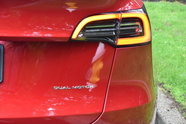 used 2022 Tesla Model Y car, priced at $22,495