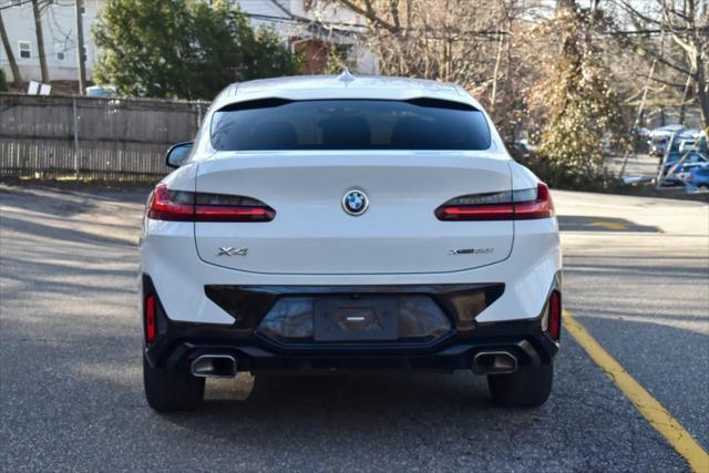 used 2022 BMW X4 car, priced at $34,995