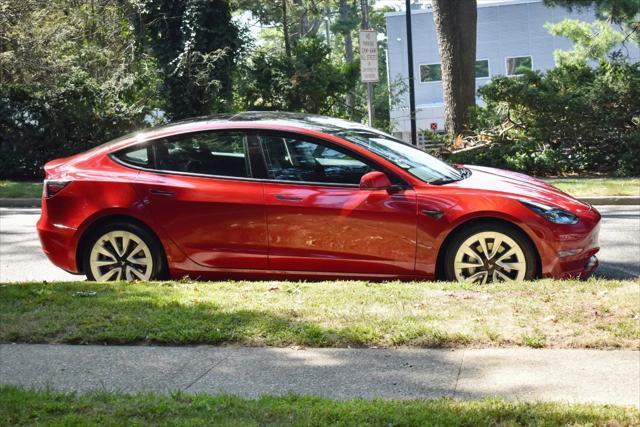 used 2023 Tesla Model 3 car, priced at $20,195