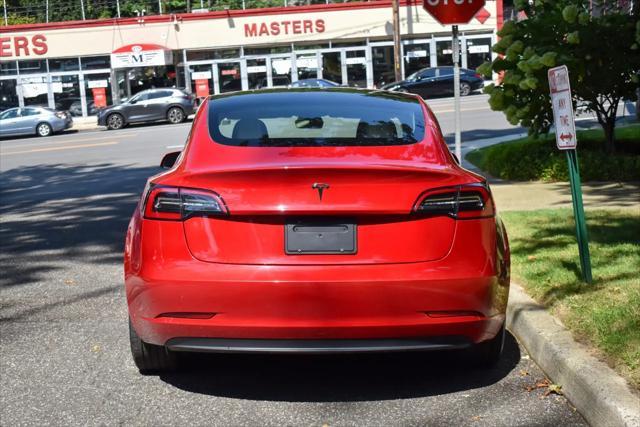 used 2023 Tesla Model 3 car, priced at $20,195