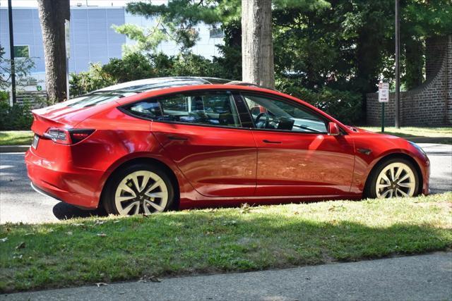 used 2023 Tesla Model 3 car, priced at $20,195