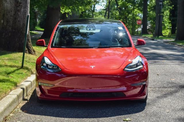 used 2023 Tesla Model 3 car, priced at $20,195