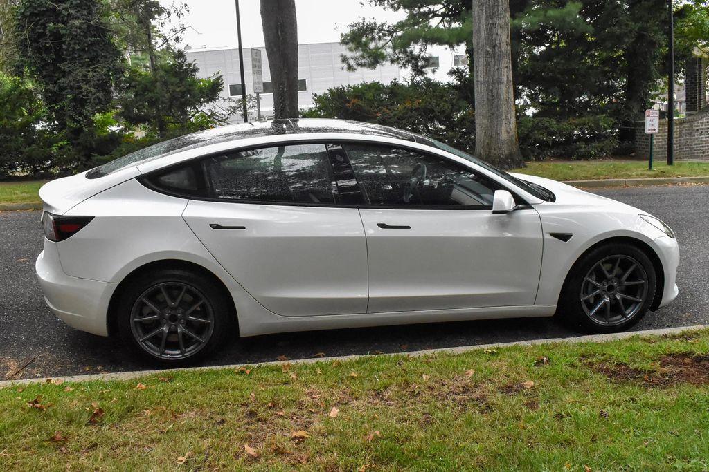 used 2023 Tesla Model 3 car, priced at $19,995