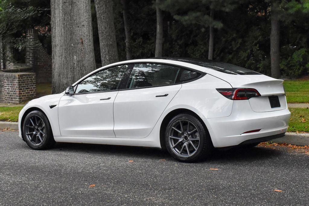 used 2023 Tesla Model 3 car, priced at $19,995
