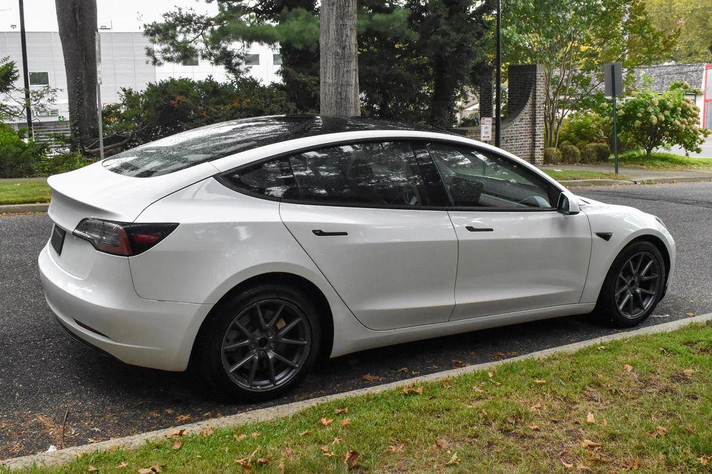 used 2023 Tesla Model 3 car, priced at $19,995