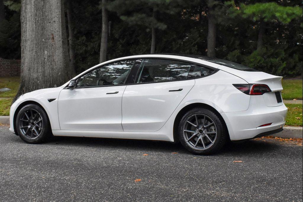 used 2023 Tesla Model 3 car, priced at $19,995