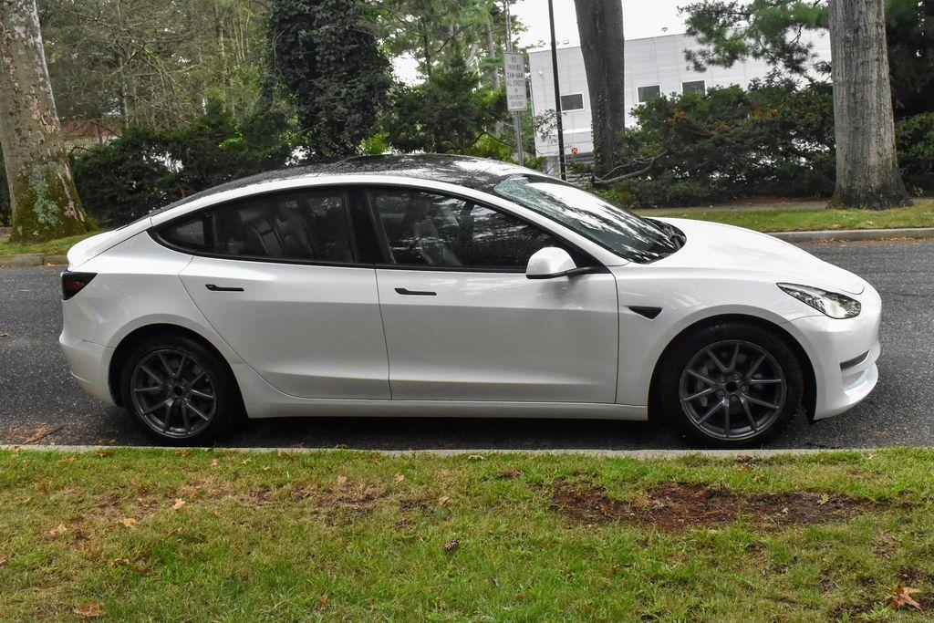 used 2023 Tesla Model 3 car, priced at $19,995