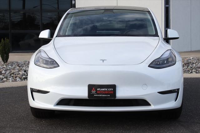 used 2023 Tesla Model Y car, priced at $38,290