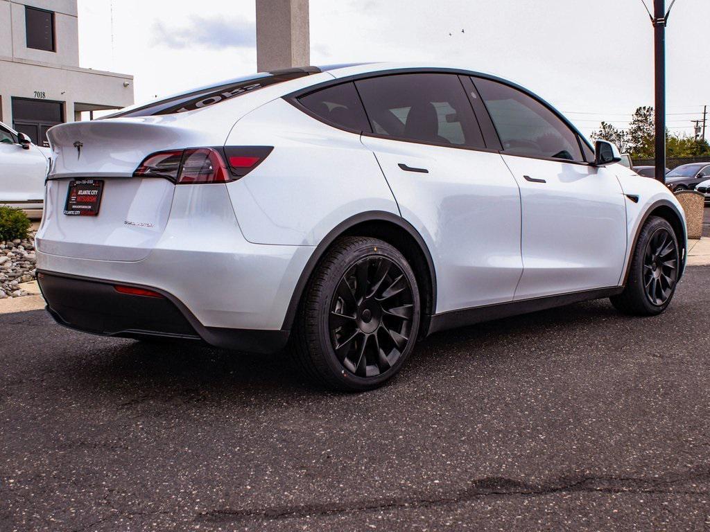 used 2023 Tesla Model Y car, priced at $28,240