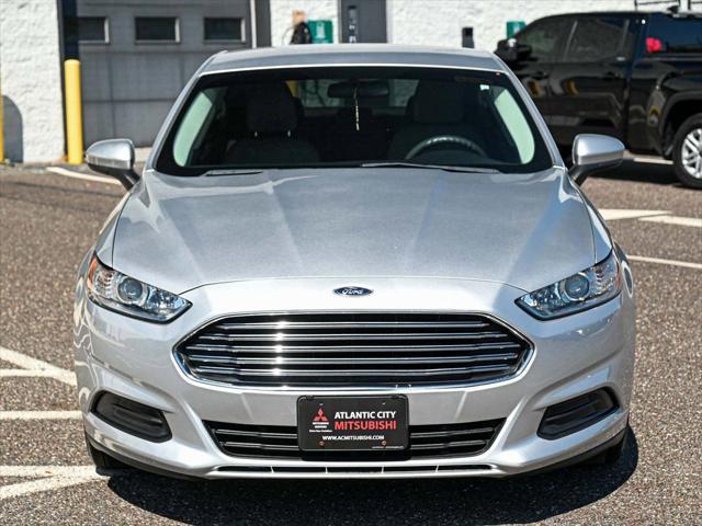 used 2016 Ford Fusion Hybrid car, priced at $9,590