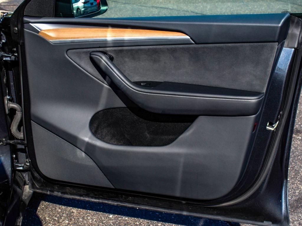 used 2025 Tesla Model Y car, priced at $35,990