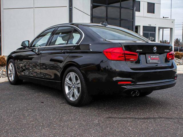 used 2018 BMW 330 car, priced at $15,990