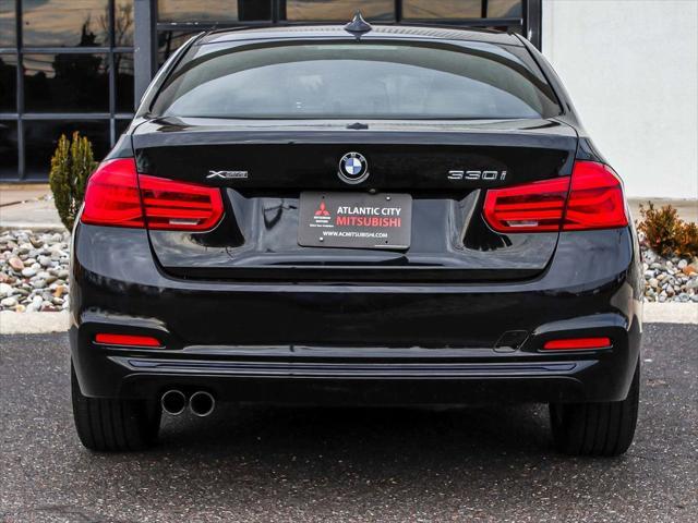 used 2018 BMW 330 car, priced at $15,990