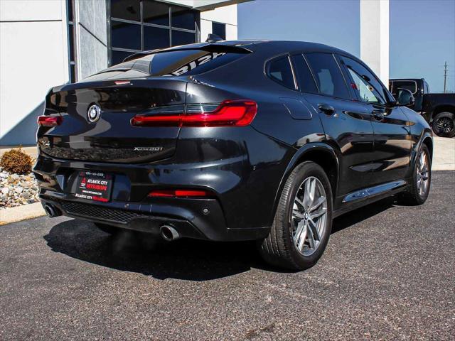 used 2021 BMW X4 car, priced at $35,490