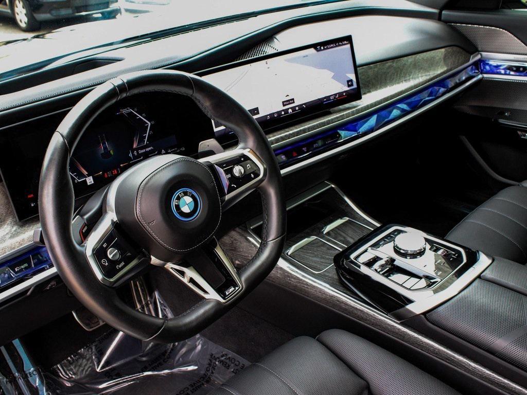 used 2024 BMW 750e car, priced at $79,990