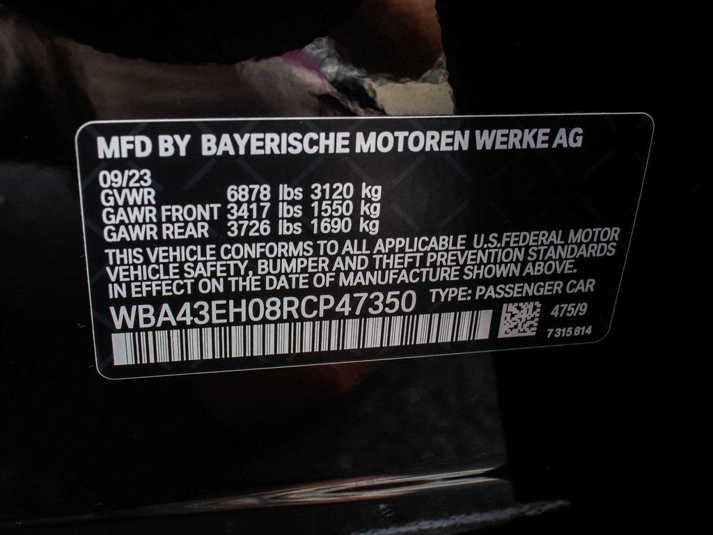 used 2024 BMW 750e car, priced at $79,990