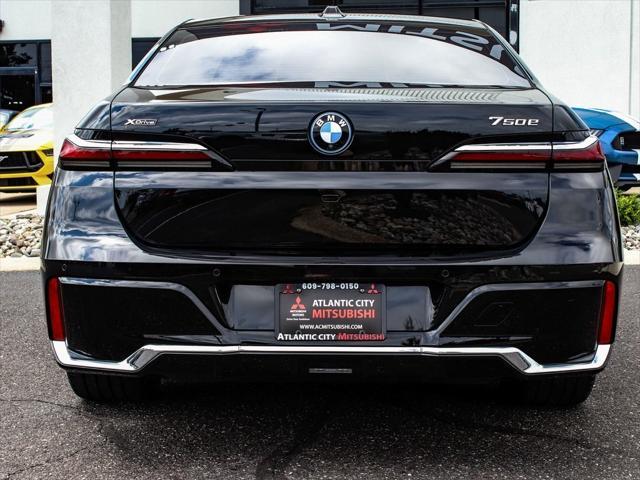 used 2024 BMW 750e car, priced at $86,490