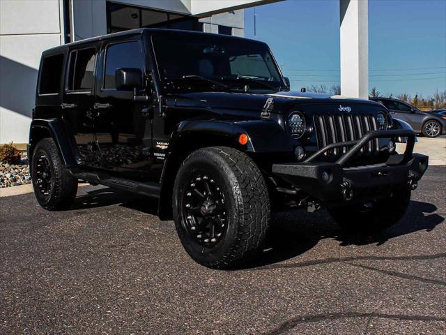 used 2014 Jeep Wrangler Unlimited car, priced at $15,490