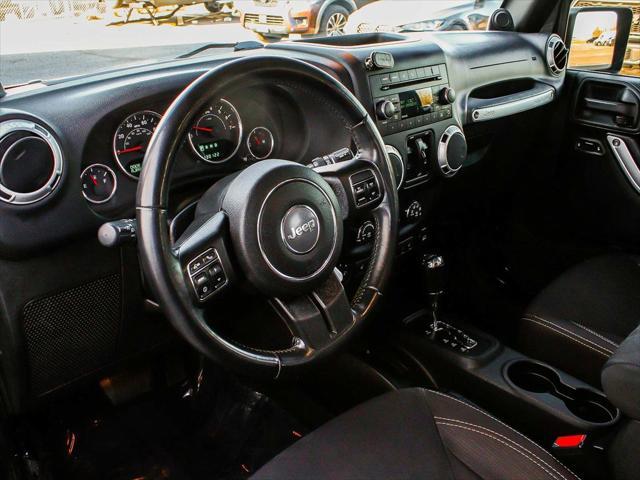 used 2014 Jeep Wrangler Unlimited car, priced at $15,490