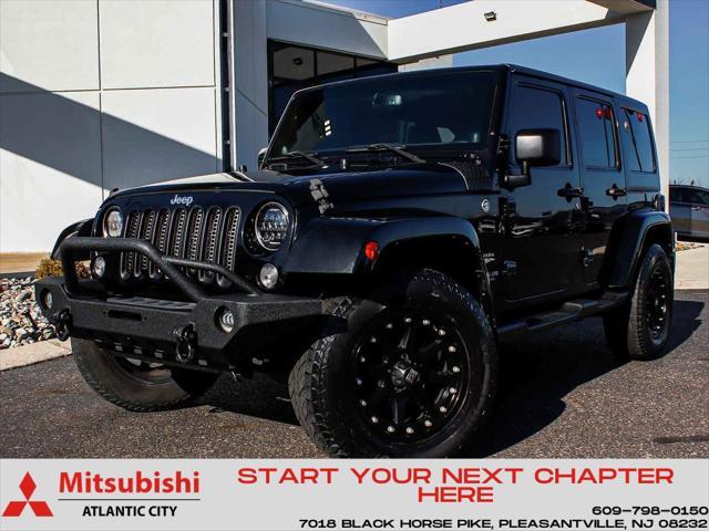 used 2014 Jeep Wrangler Unlimited car, priced at $15,490