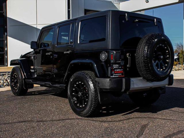 used 2014 Jeep Wrangler Unlimited car, priced at $15,490