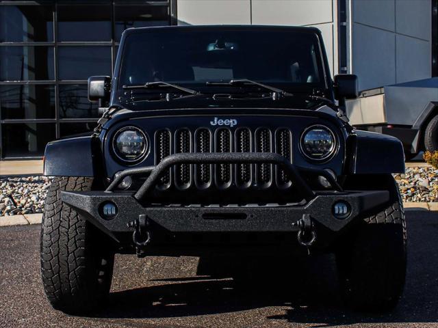 used 2014 Jeep Wrangler Unlimited car, priced at $15,490