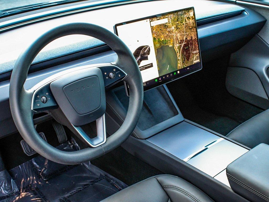 used 2025 Tesla Model 3 car, priced at $33,450