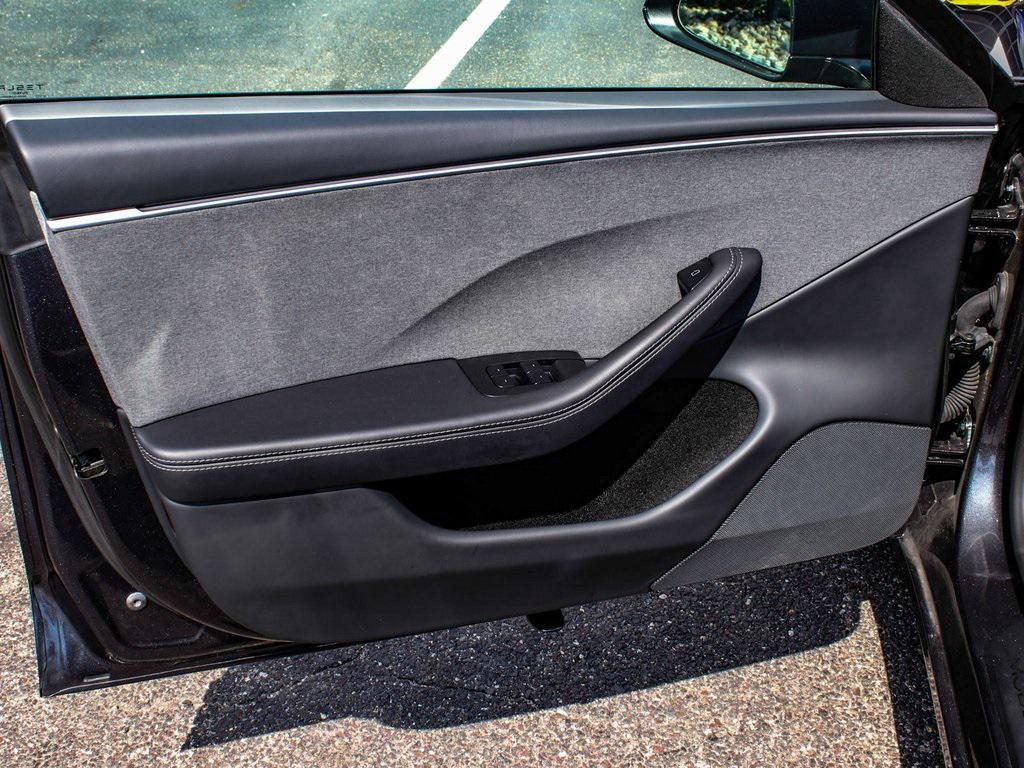 used 2025 Tesla Model 3 car, priced at $33,450