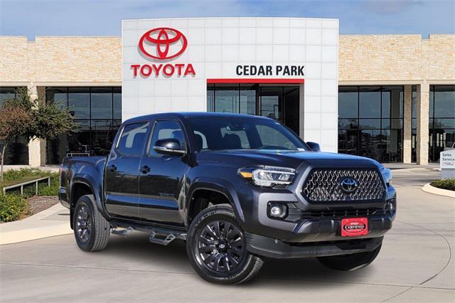 used 2021 Toyota Tacoma car, priced at $34,991