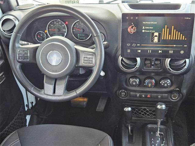 used 2015 Jeep Wrangler Unlimited car, priced at $21,291