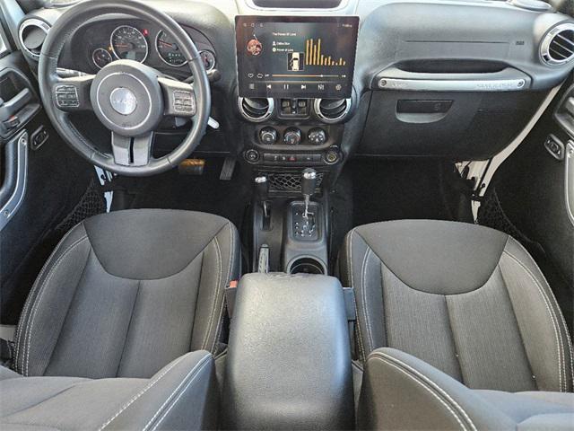 used 2015 Jeep Wrangler Unlimited car, priced at $21,291