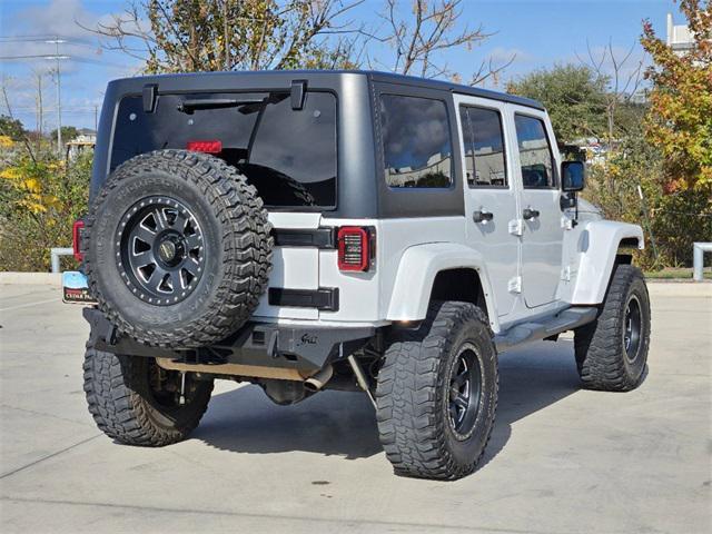 used 2015 Jeep Wrangler Unlimited car, priced at $21,291