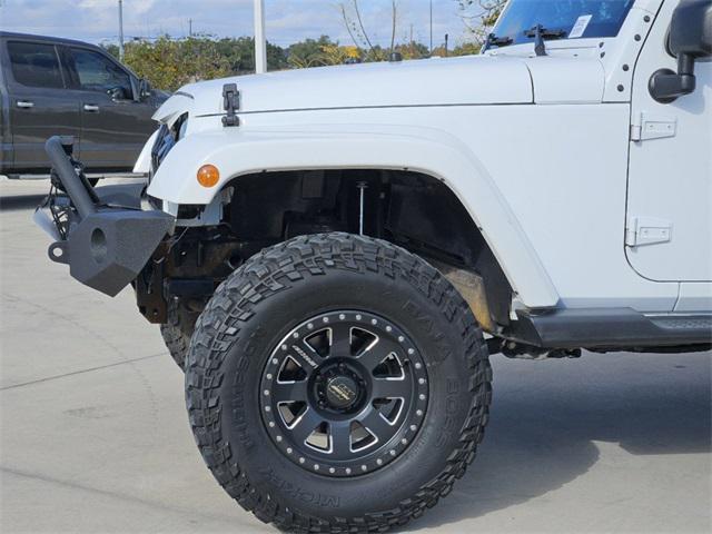 used 2015 Jeep Wrangler Unlimited car, priced at $21,291