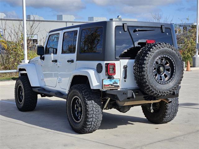 used 2015 Jeep Wrangler Unlimited car, priced at $21,291