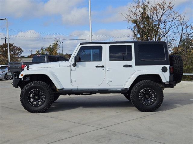 used 2015 Jeep Wrangler Unlimited car, priced at $21,291