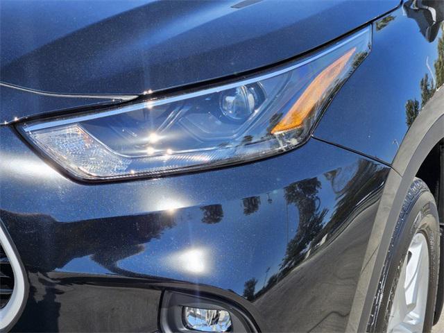 used 2024 Toyota Highlander car, priced at $41,243