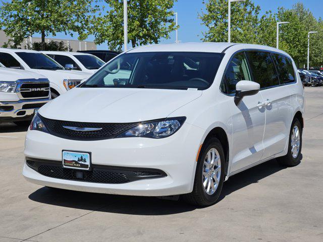 used 2023 Chrysler Voyager car, priced at $22,352