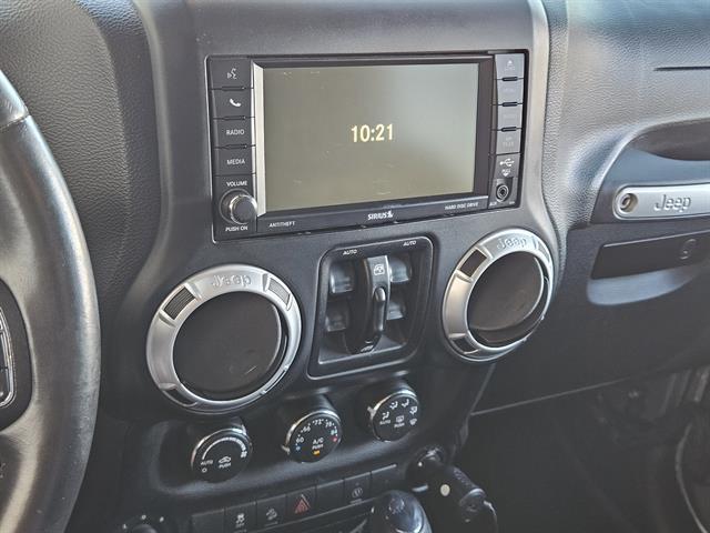 used 2013 Jeep Wrangler Unlimited car, priced at $16,791