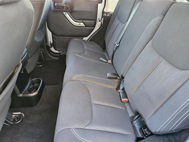 used 2013 Jeep Wrangler Unlimited car, priced at $16,791