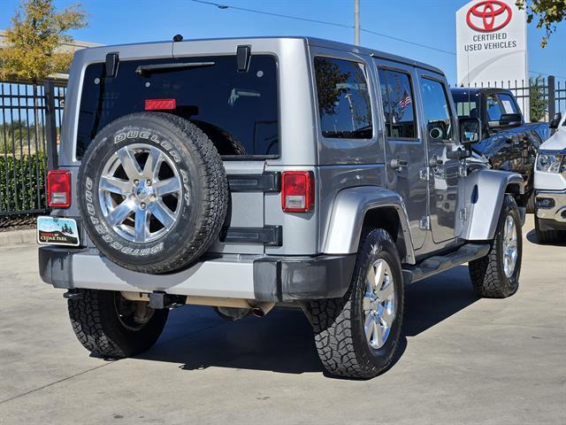 used 2013 Jeep Wrangler Unlimited car, priced at $16,791