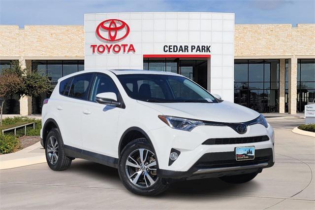 used 2018 Toyota RAV4 car, priced at $19,271