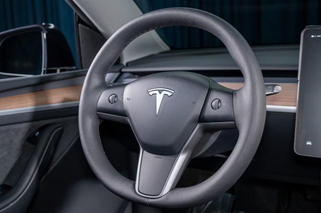 used 2024 Tesla Model Y car, priced at $35,991