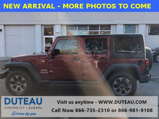 used 2013 Jeep Wrangler Unlimited car, priced at $15,900