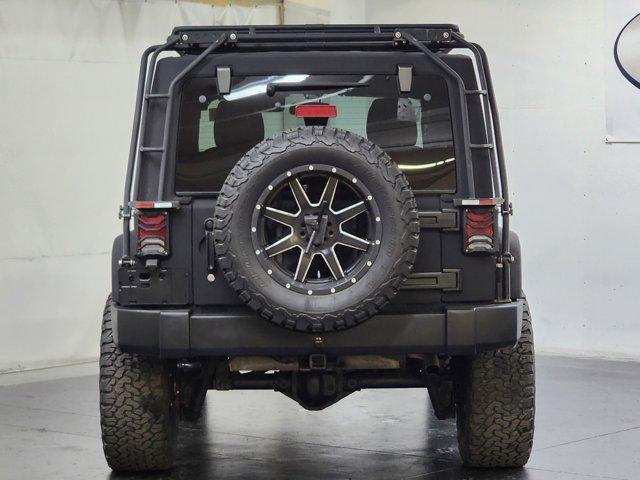 used 2016 Jeep Wrangler Unlimited car, priced at $25,599