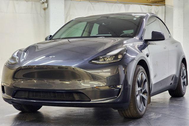 used 2024 Tesla Model Y car, priced at $35,999