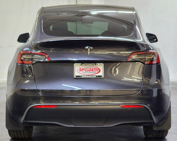 used 2024 Tesla Model Y car, priced at $35,999